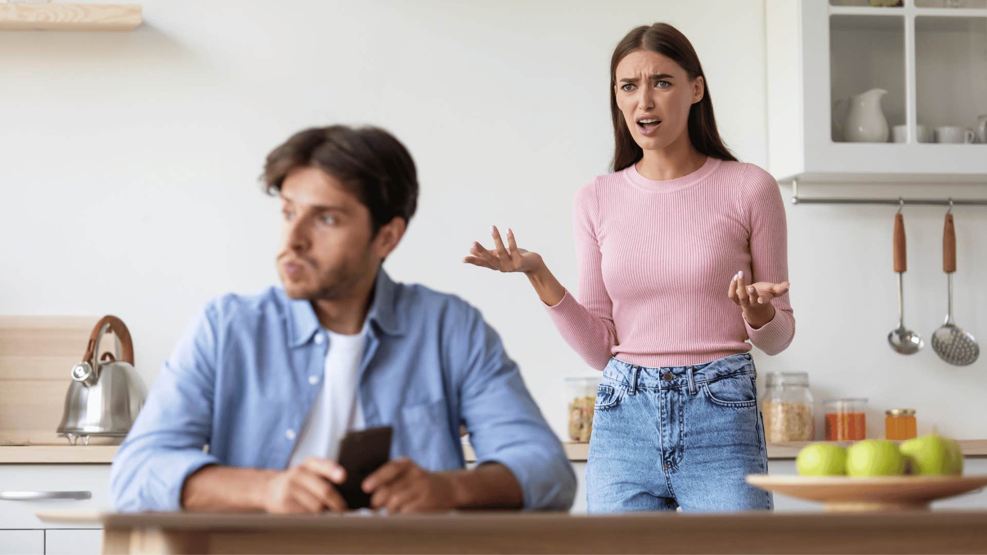 man ignoring an unhappy woman