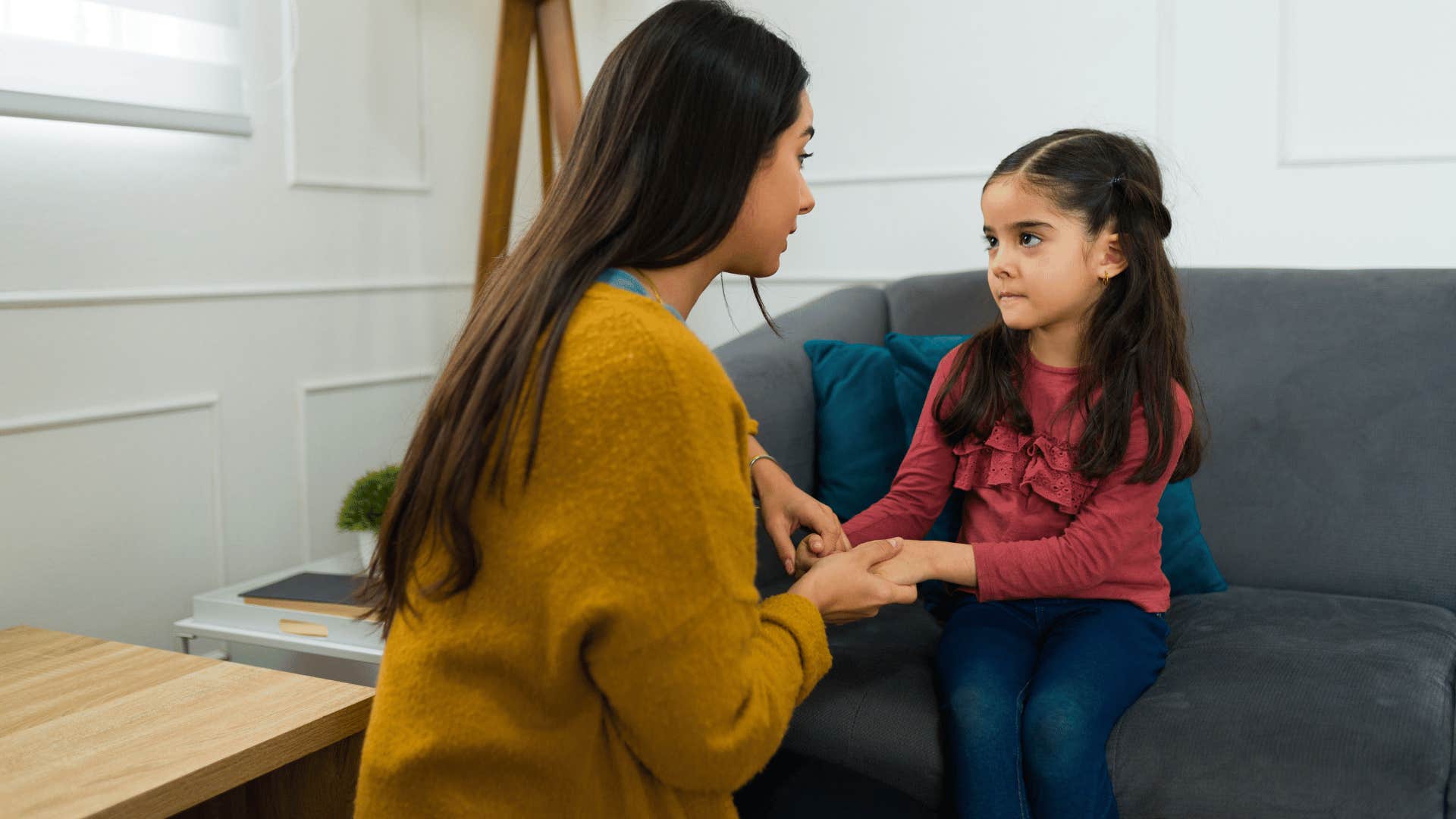 mom talking to a young girl