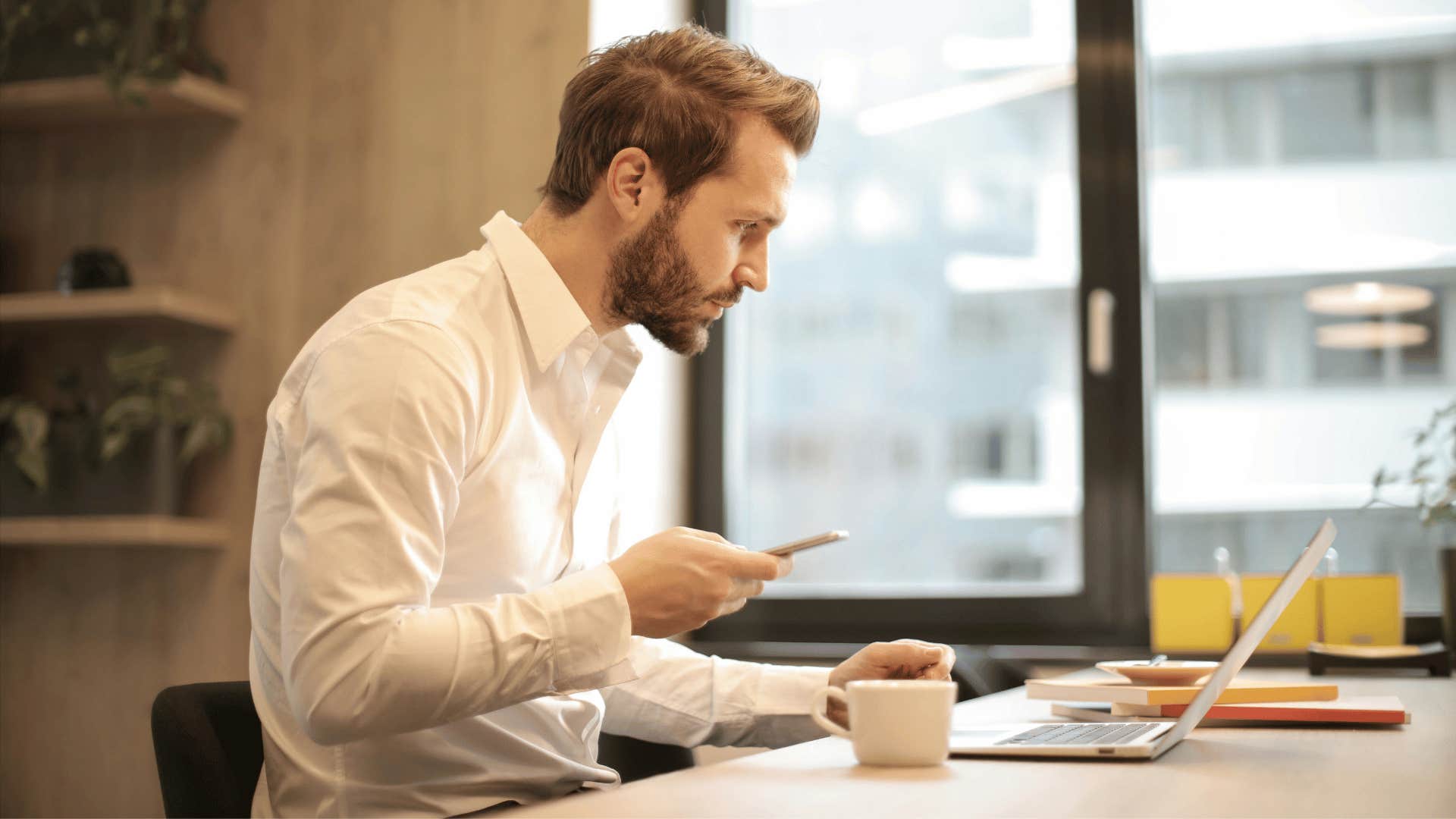 professional man focused on a laptop screen