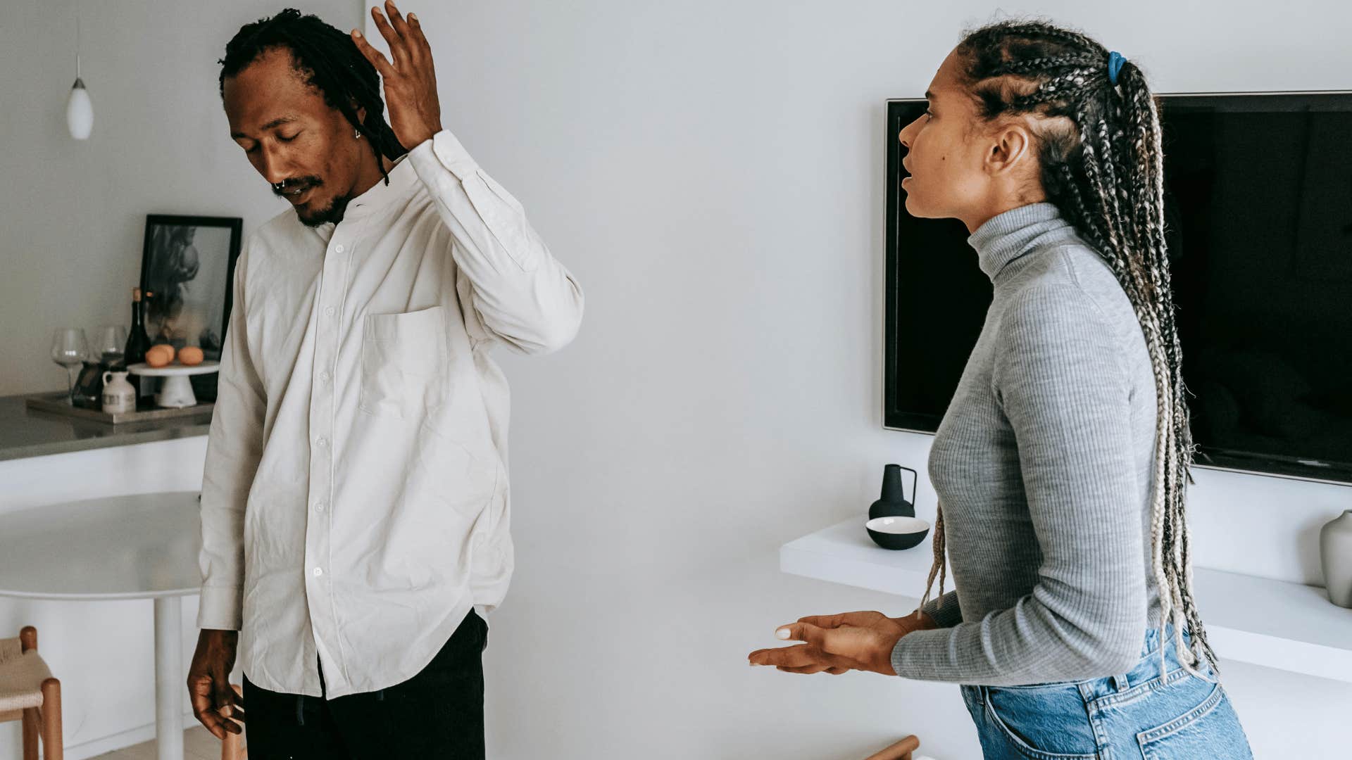 couple arguing in their home