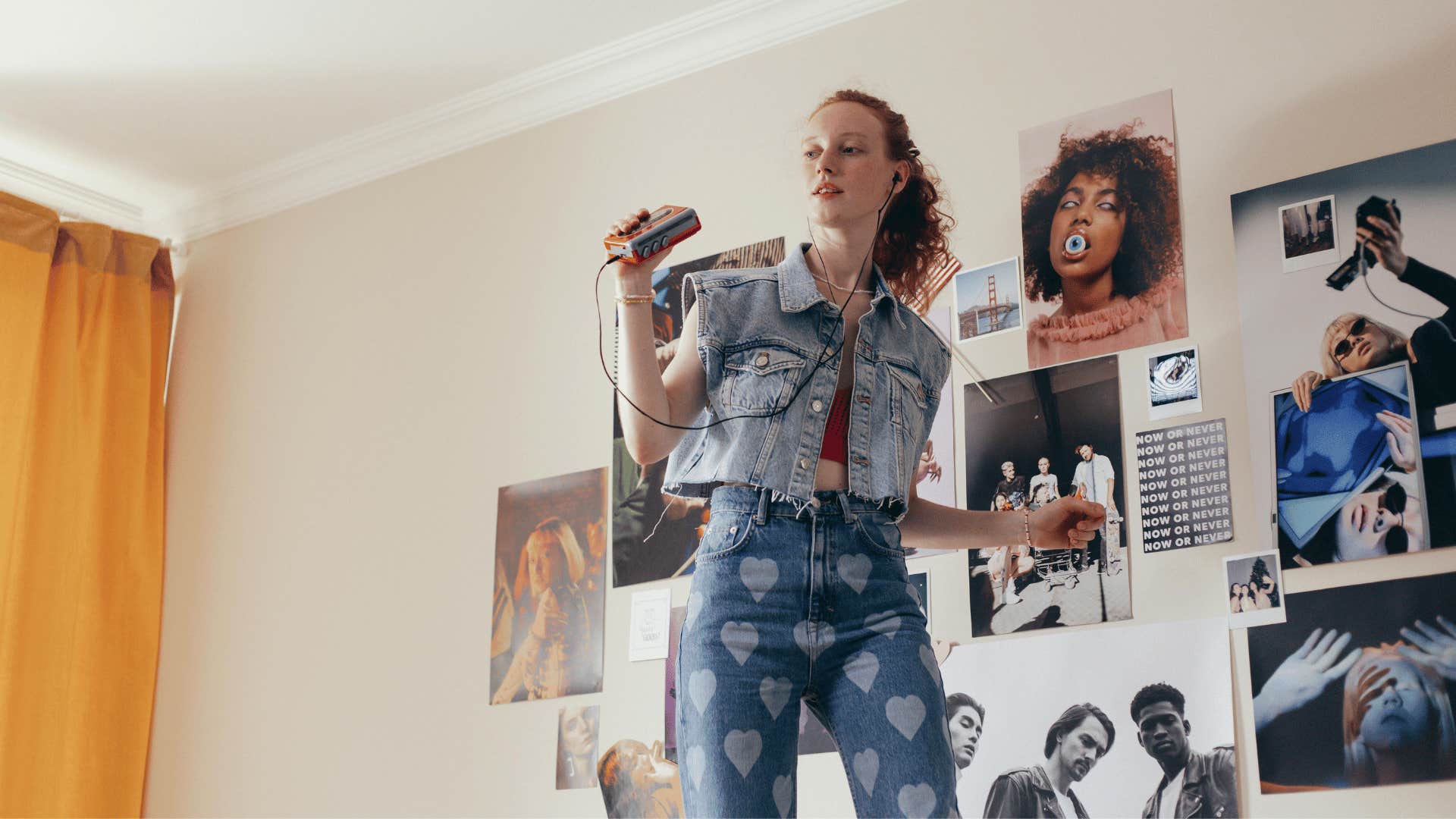 young woman dancing alone in a room