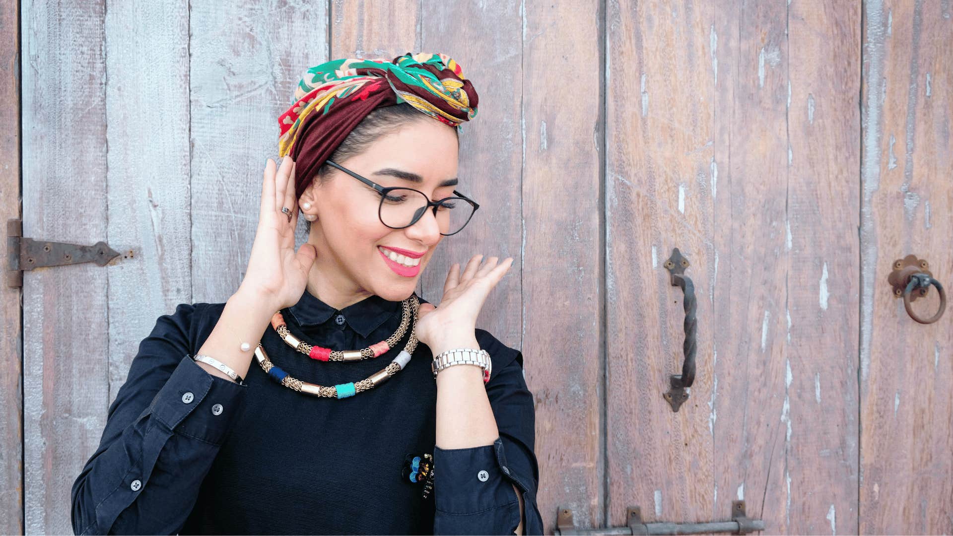 smiling woman wearing glasses