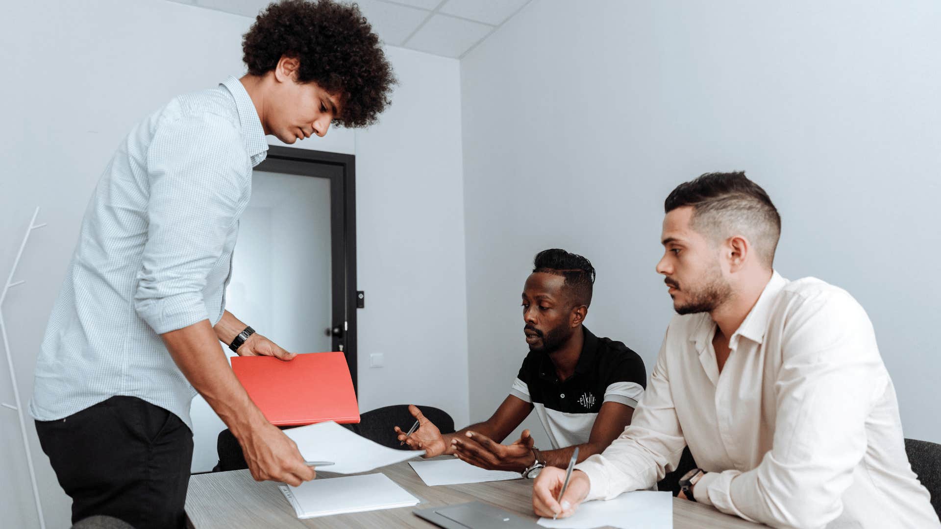 three coworkers working together