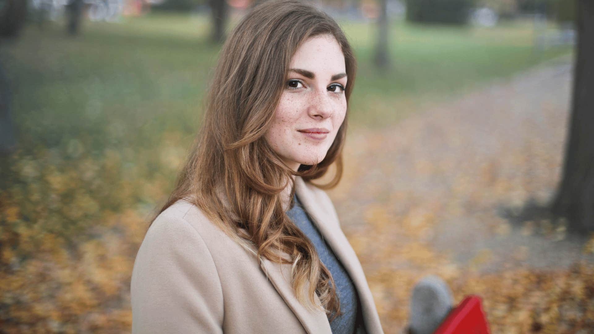 young woman smiling gently