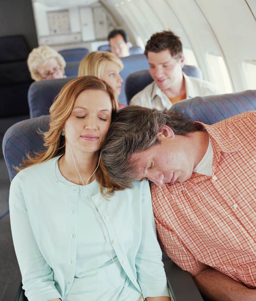 passengers seated on crowded flight