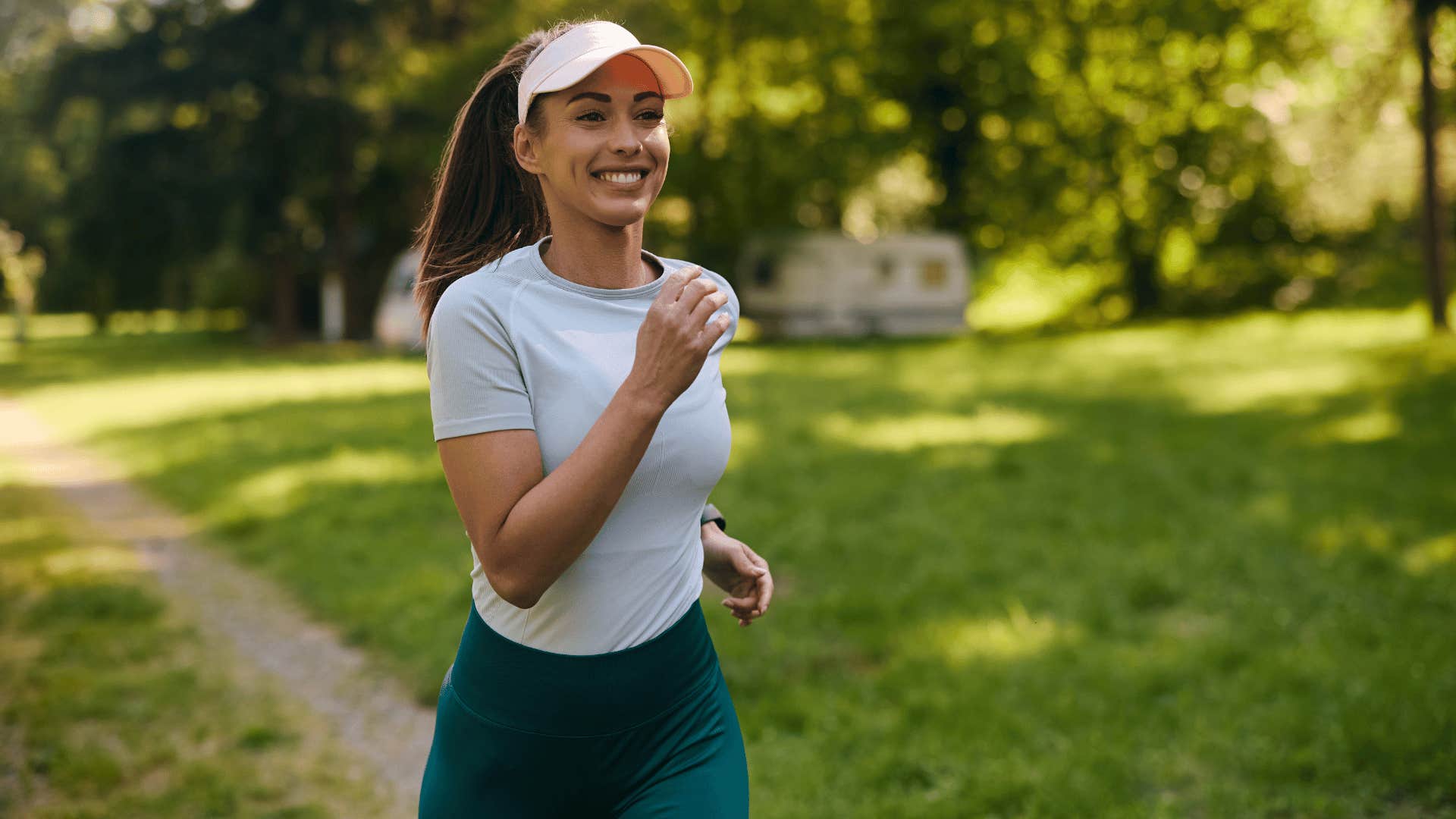 woman running while smiling 