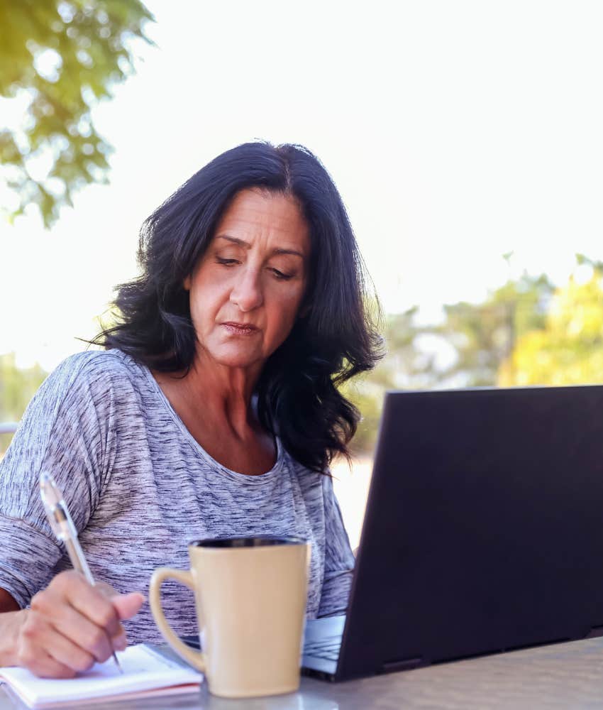 Boomer woman searching for job on laptop