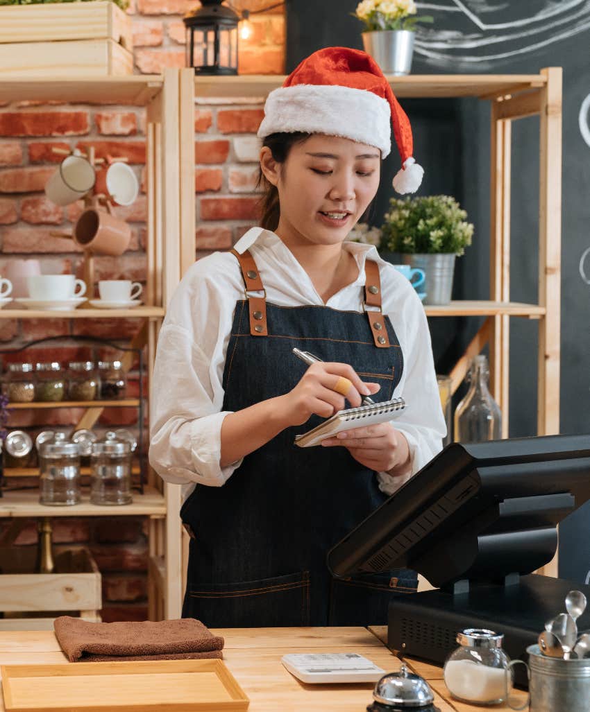 Cafe staff member working during the holiday season