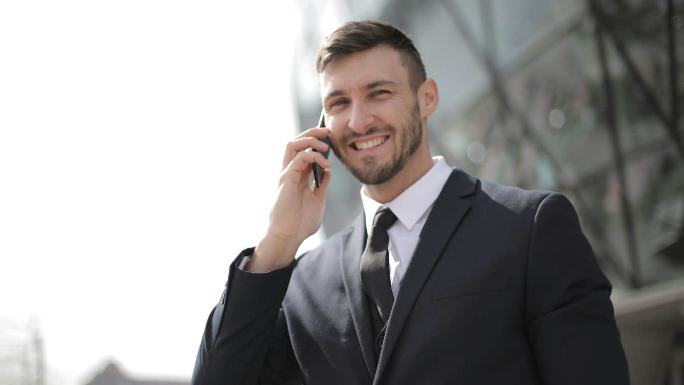 Man in suit on phone