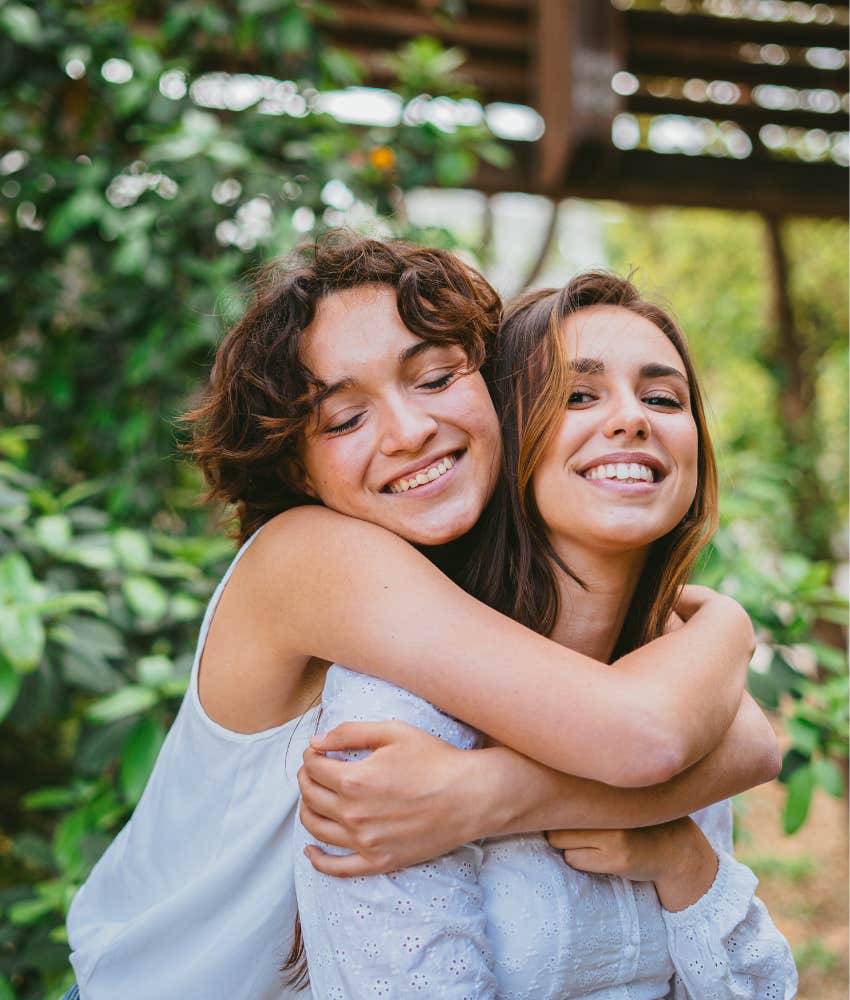 two friends hugging