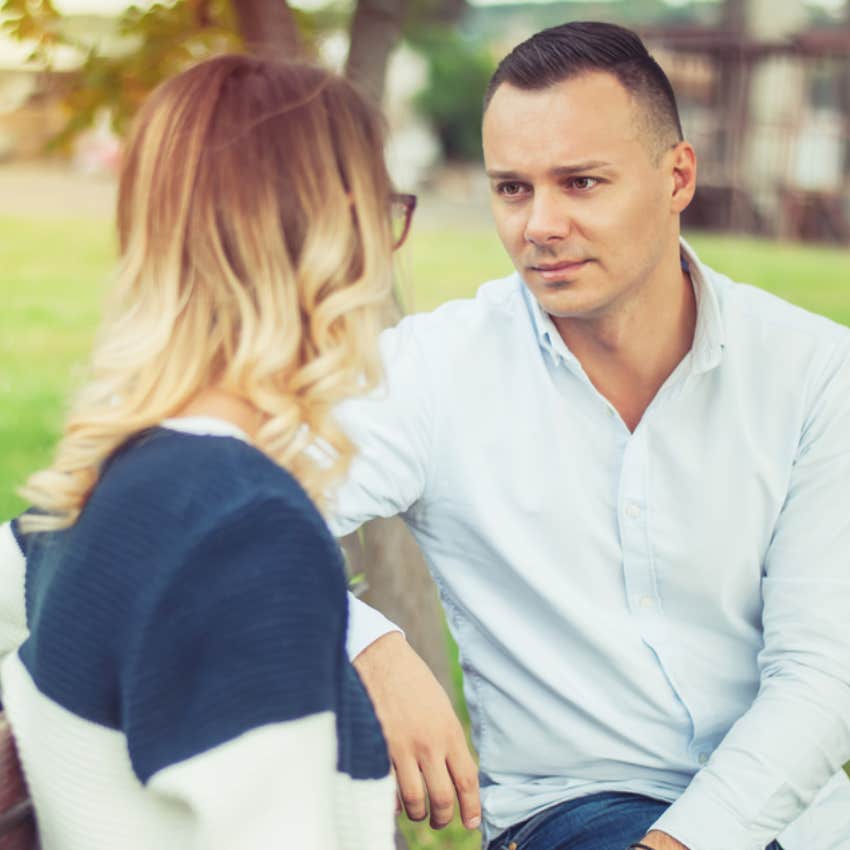 man listening to woman