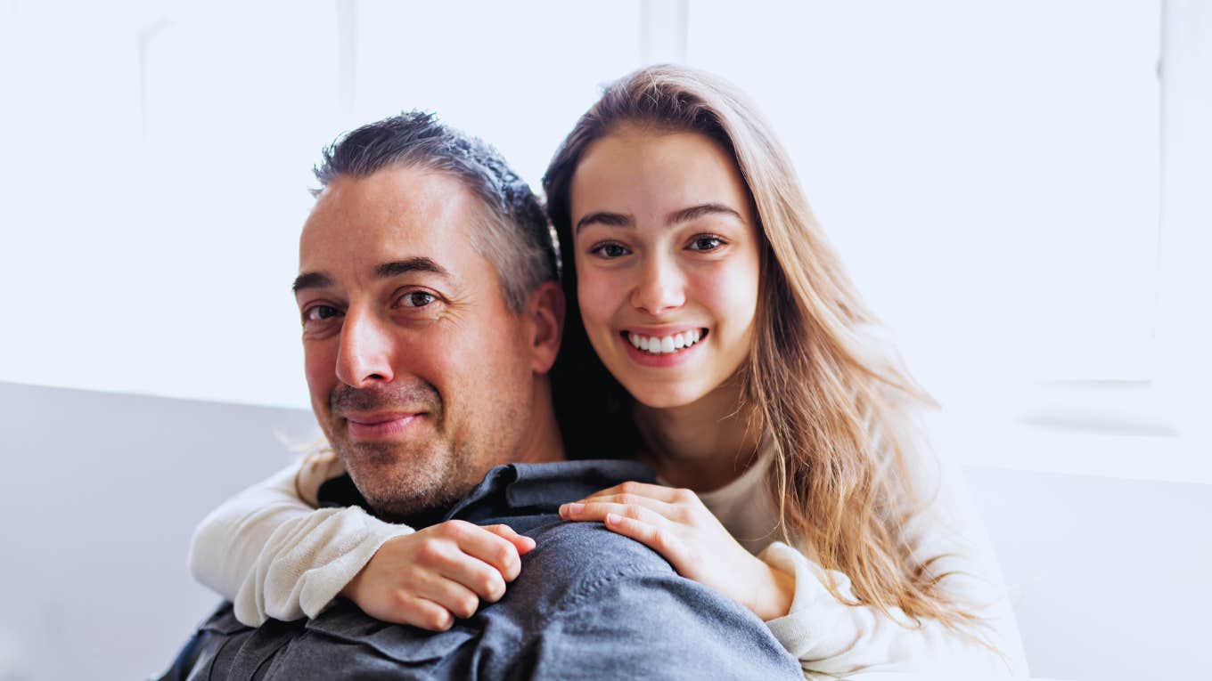 Father and daughter hugging