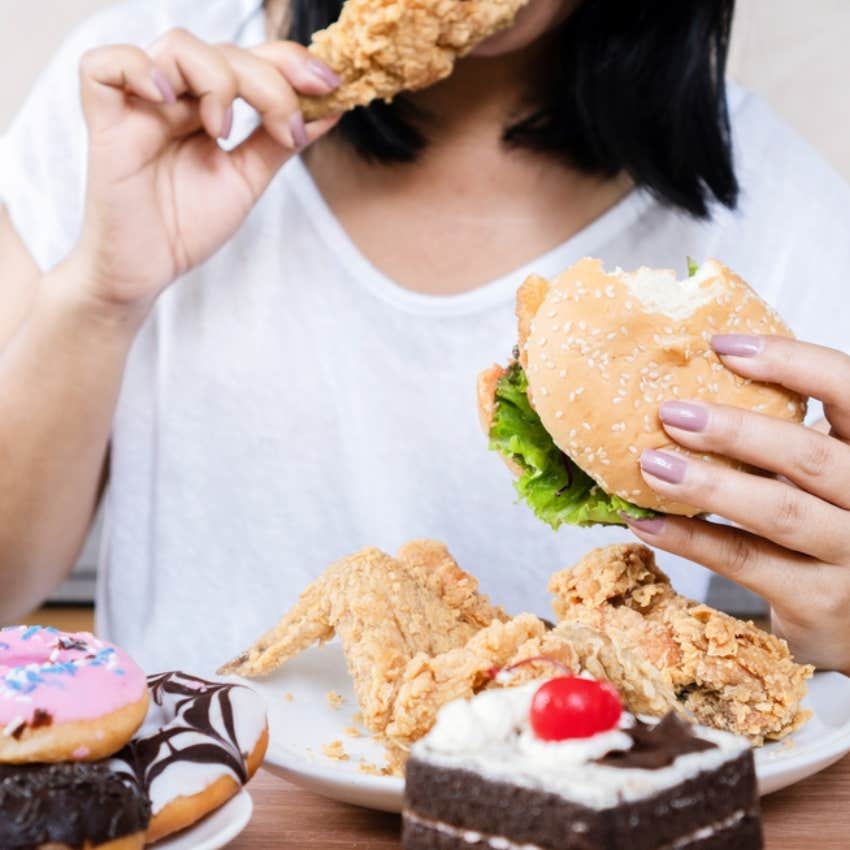 woman eating junk food 