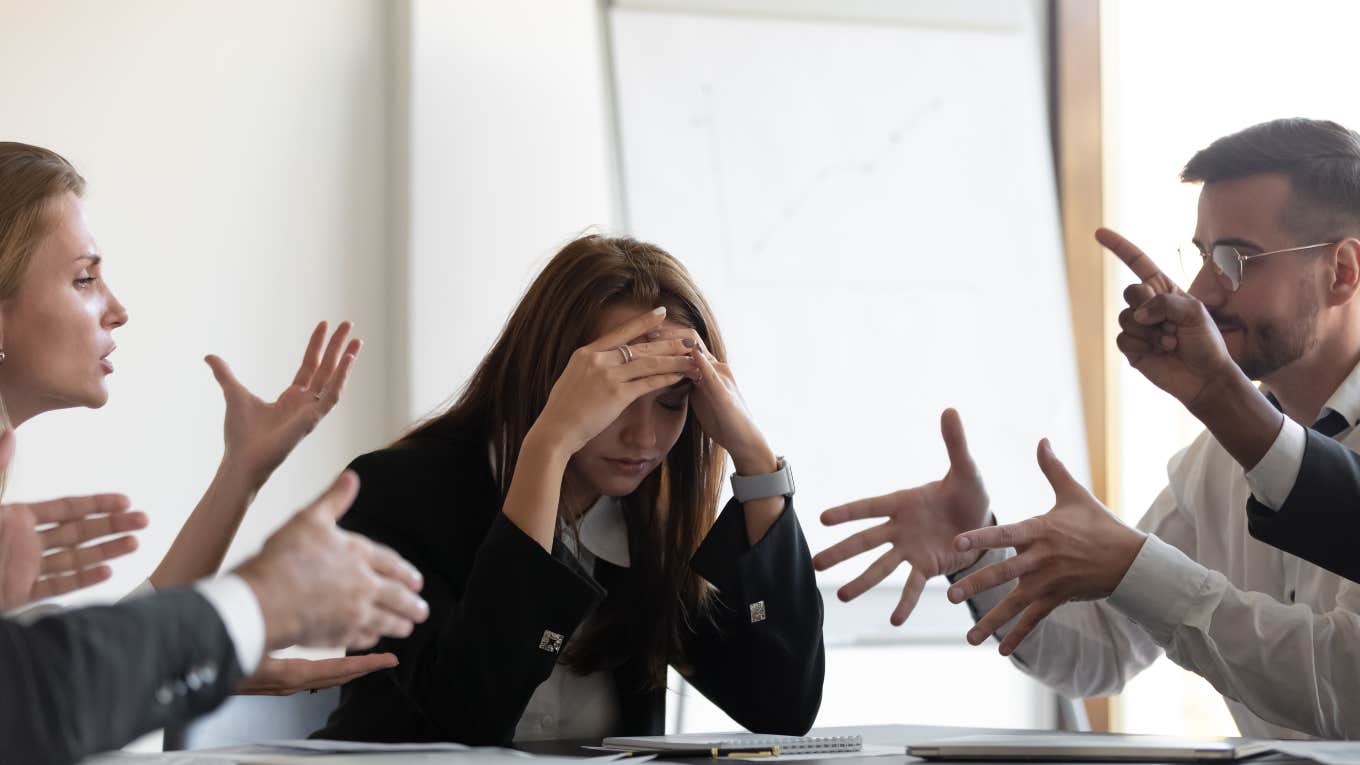 group of workers arguing with each other