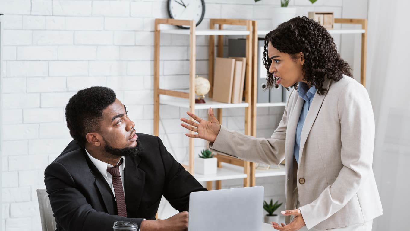 Employee being reprimanded by boss for talking about pay