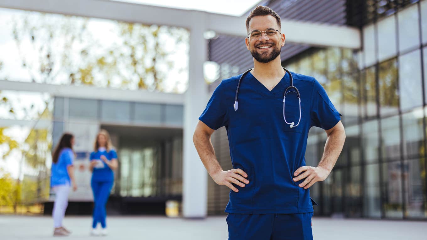 nurse standing outside of a hospital