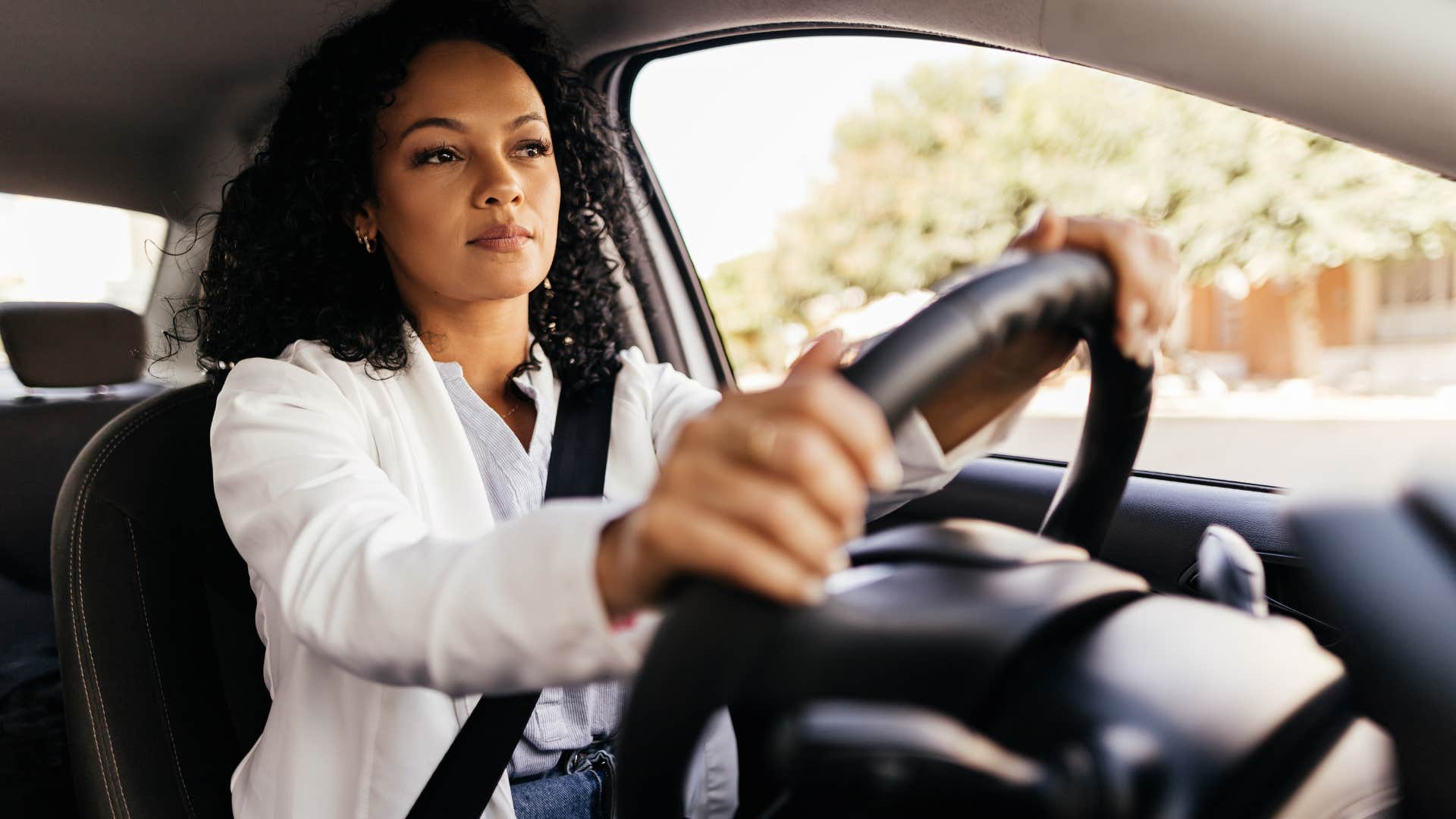 Woman driving her car