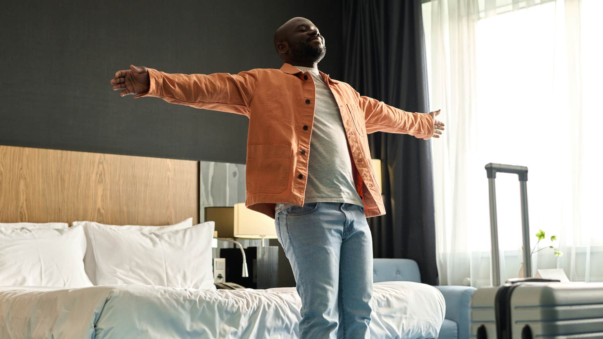 Man relaxing in his hotel room