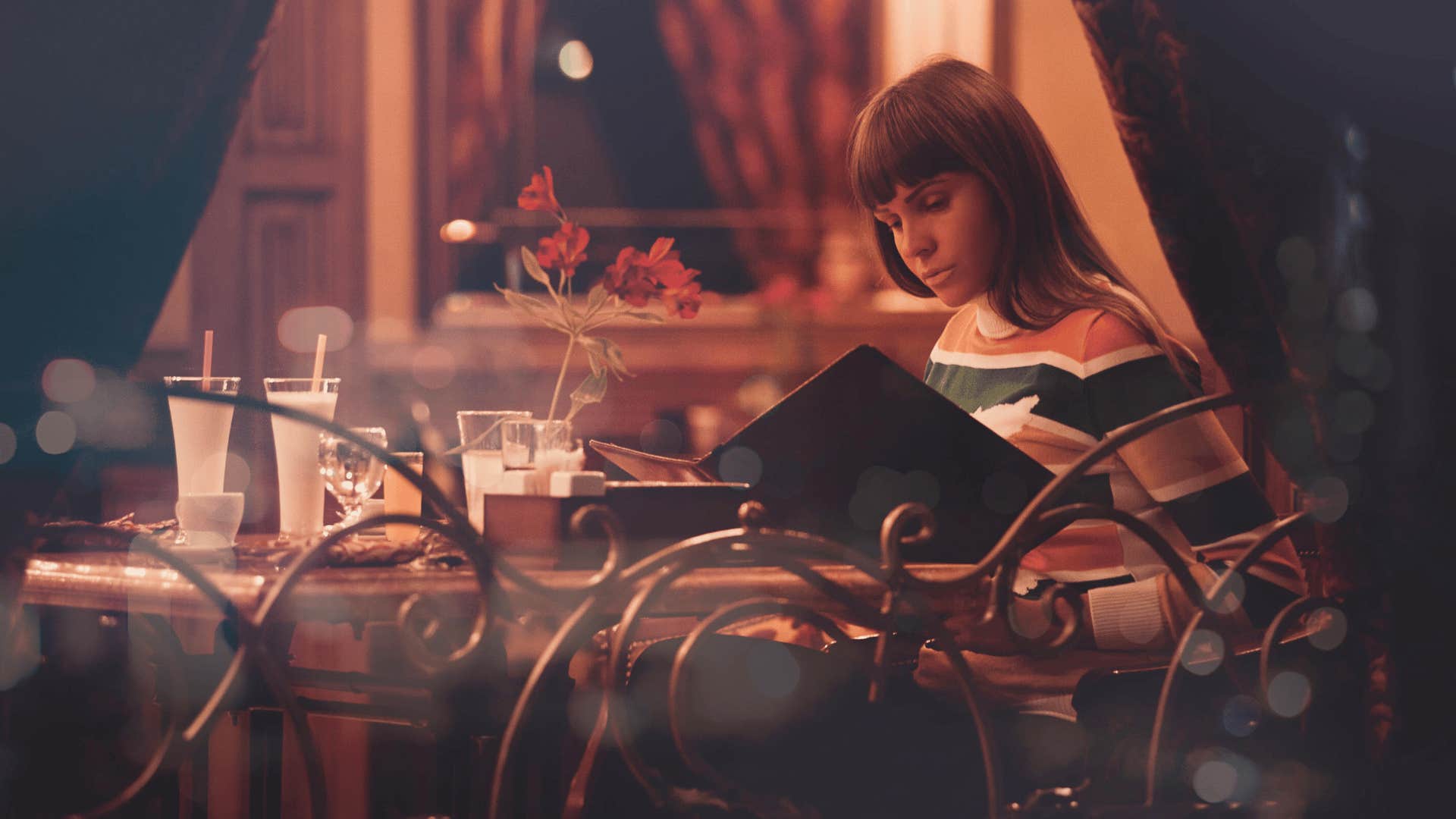 woman sitting alone at a restaurant