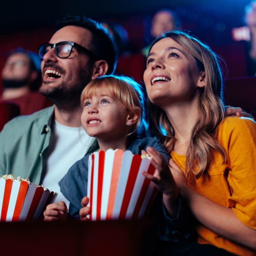 family watching movie in theater 