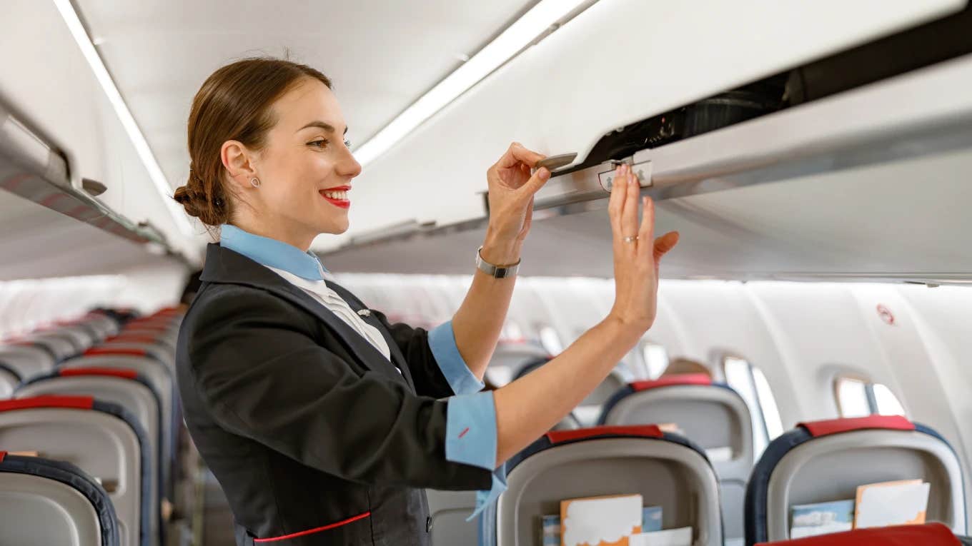 Flight attendant on airplane