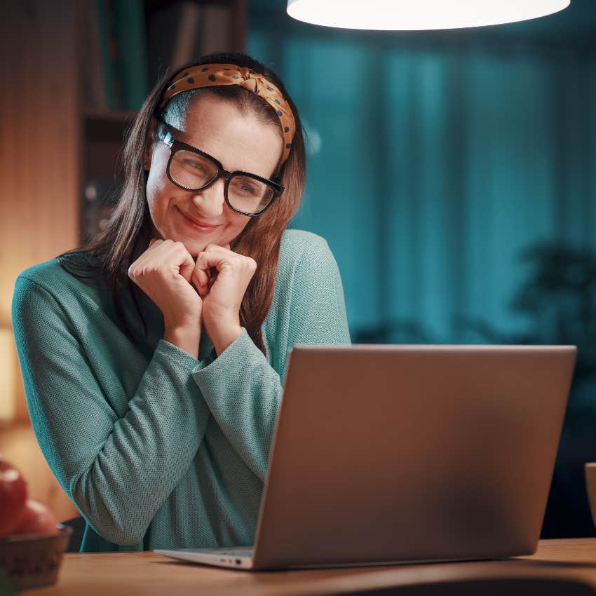 Flirty woman making a Pinterest board