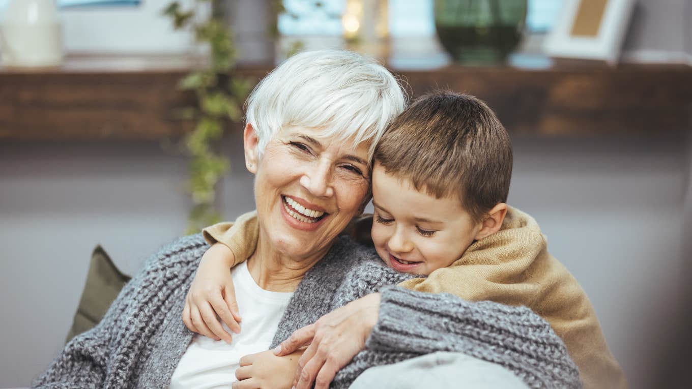 Grandma getting hug from grandson