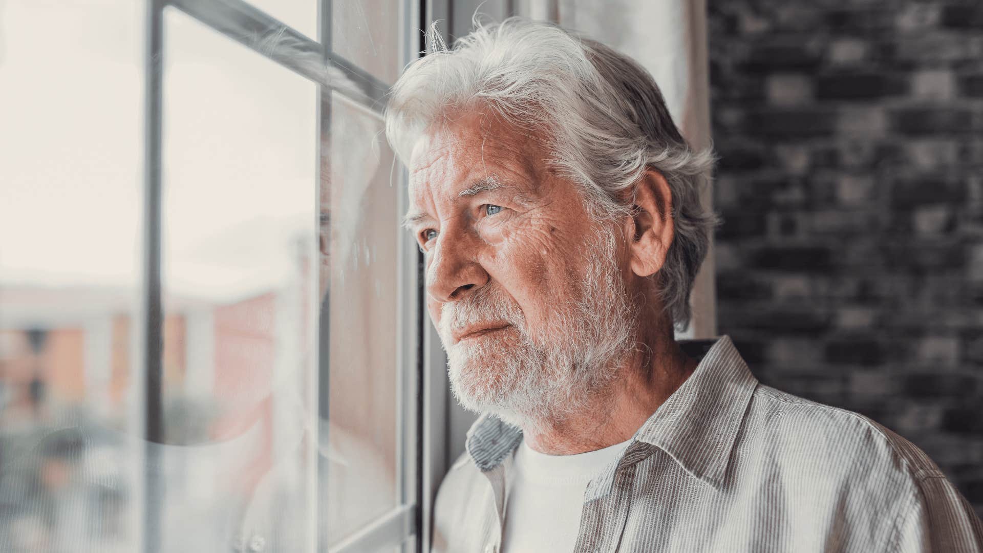 grandfather looking out the window