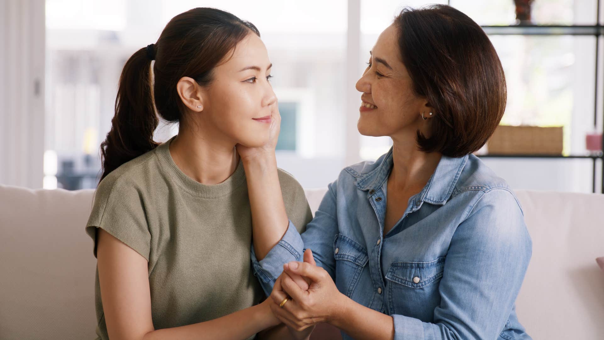 Mom speaking kindly to her teenage daughter.