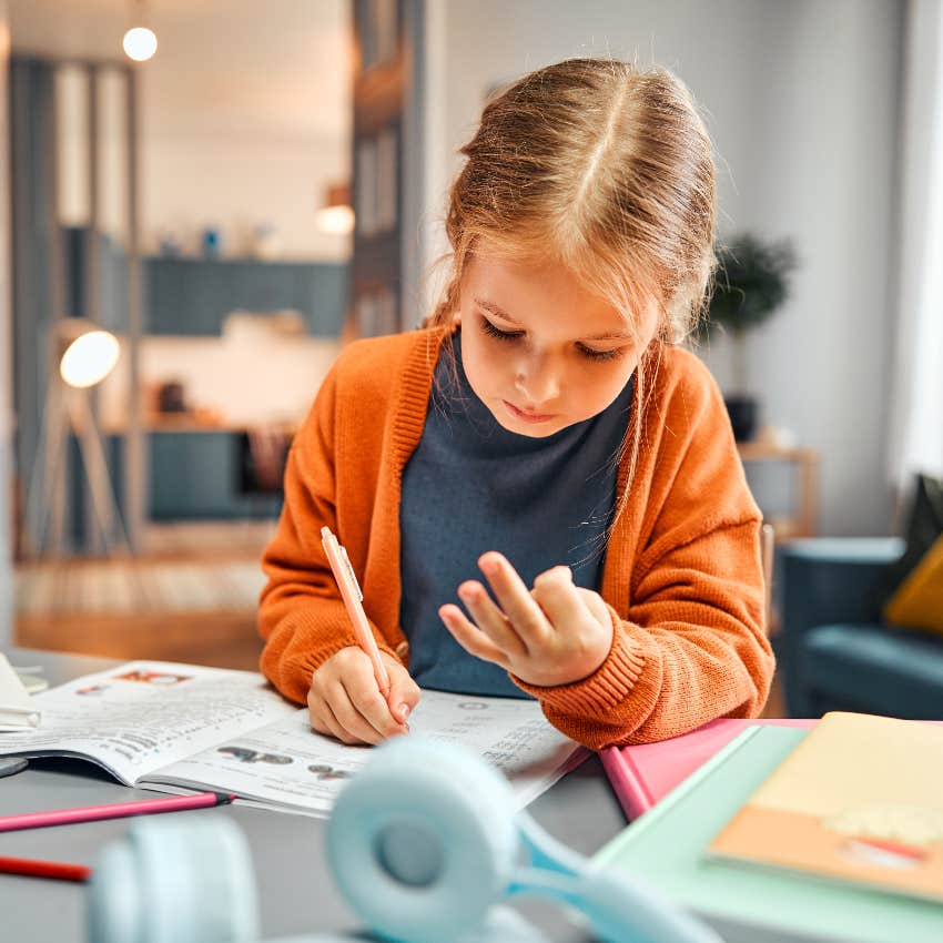 Child counting on her fingers