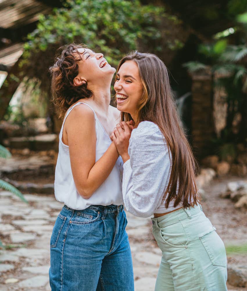 two friends laughing together