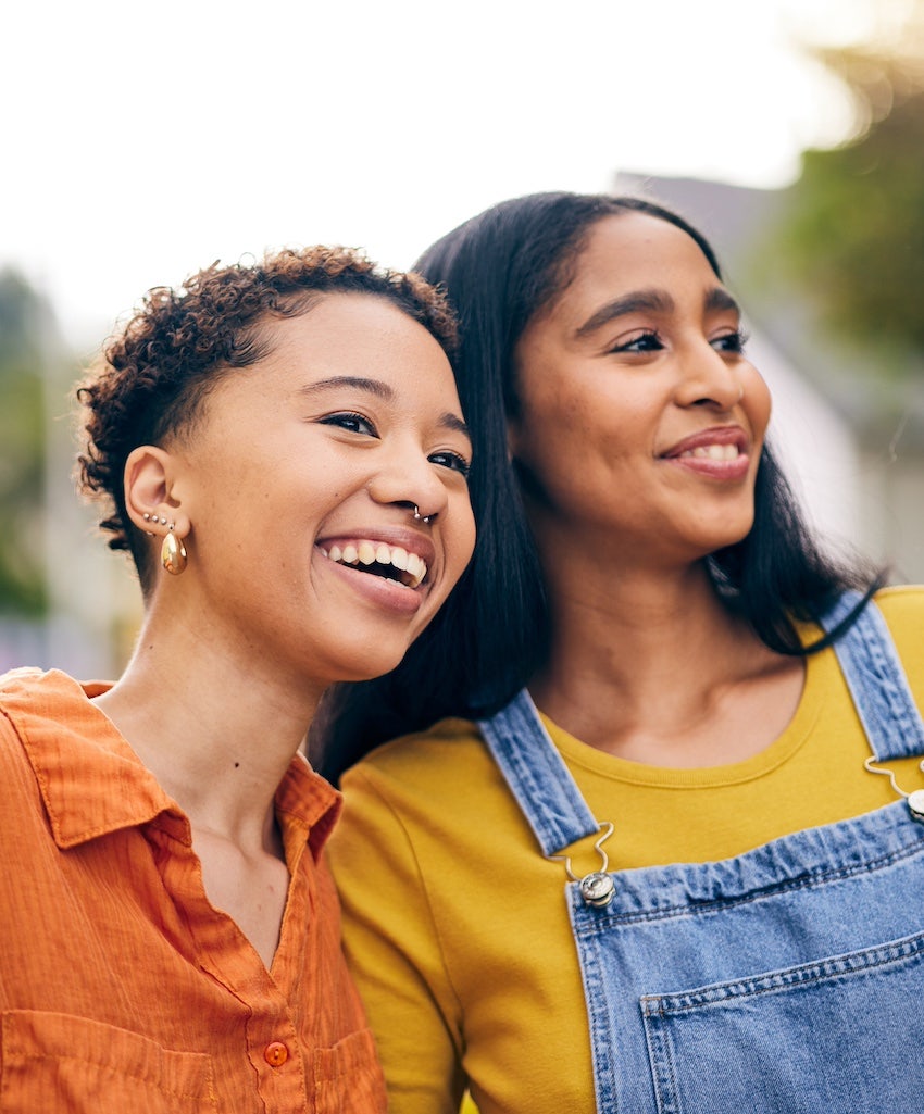 Two friends smile and have fun