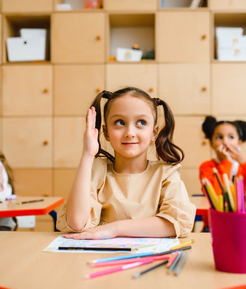 little girl sitting in class after drinking a hard seltzer at school