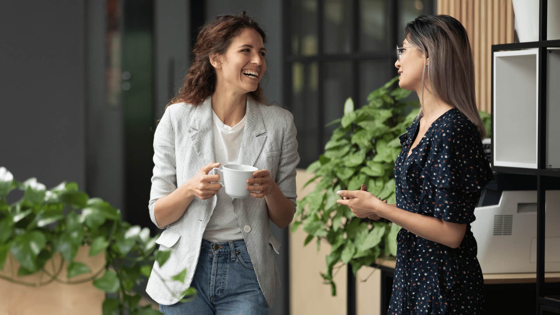 two women talking to each other 