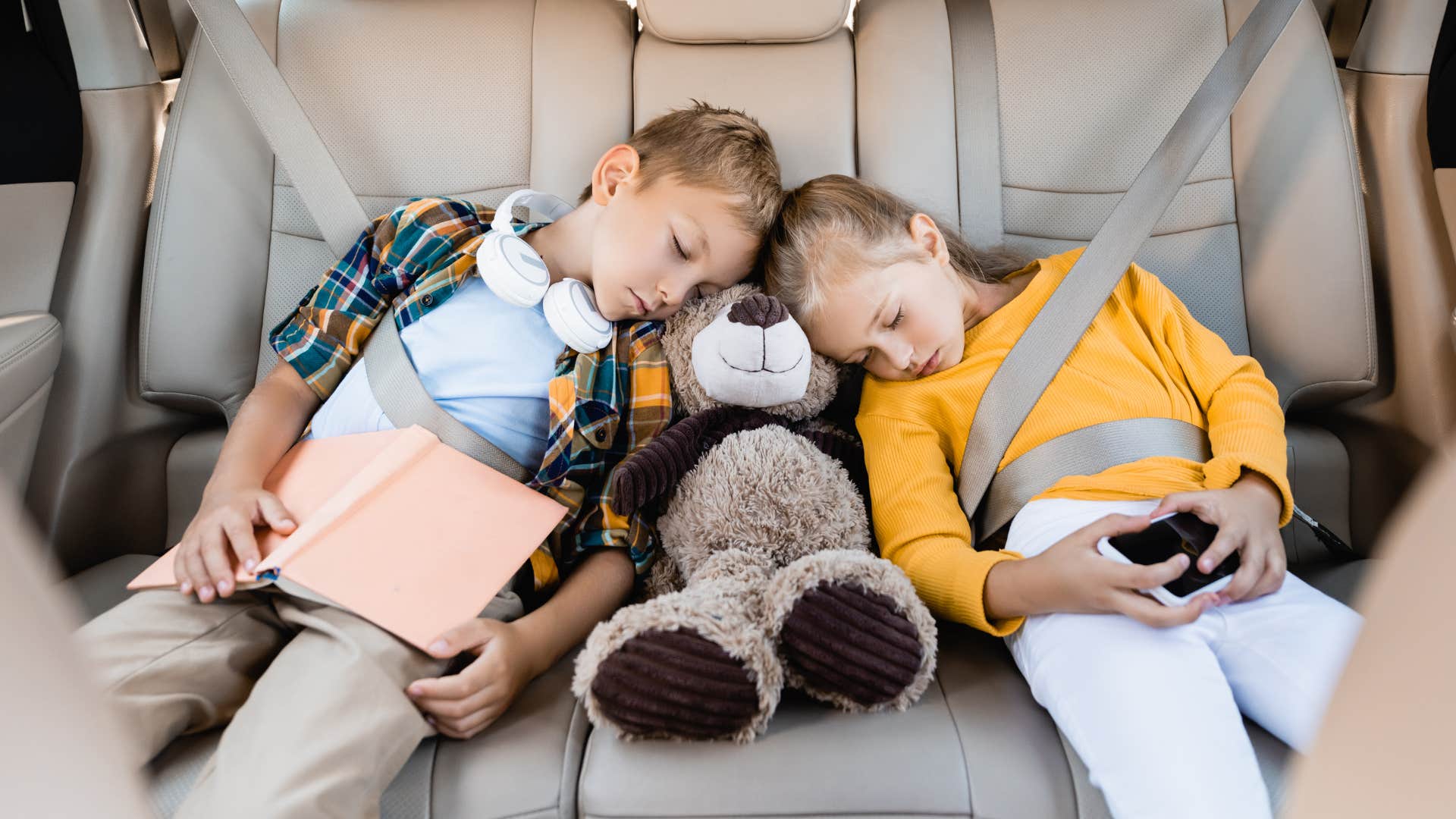 Kids sleeping in the backseat