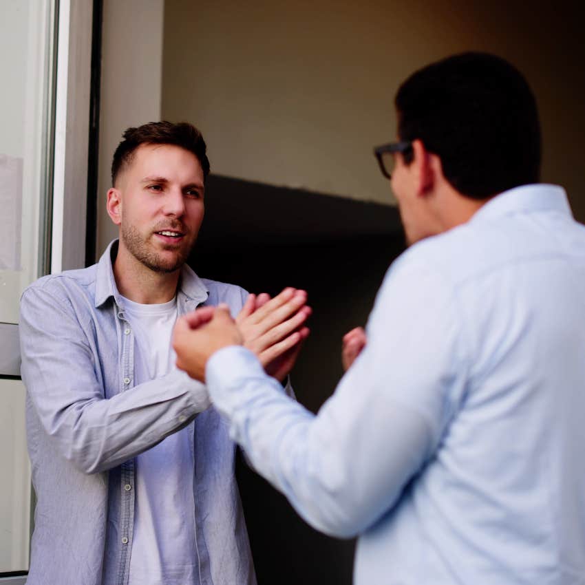 Man arguing with his neighbor about access to his basement