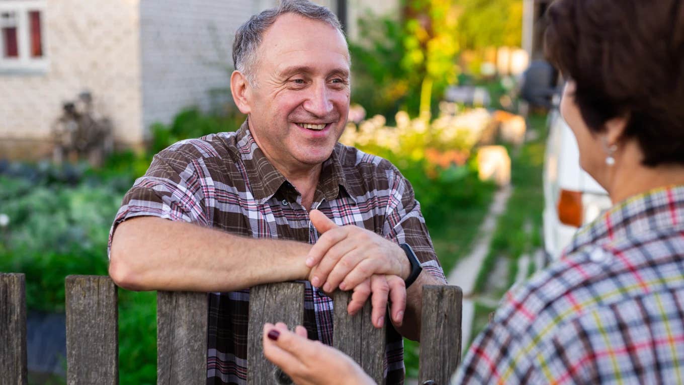 Man asking his neighbor a question