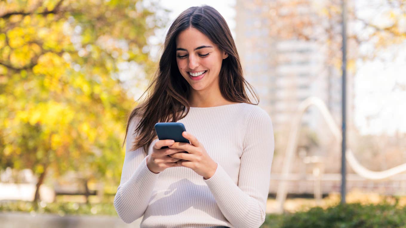 Woman texting on her cell phone