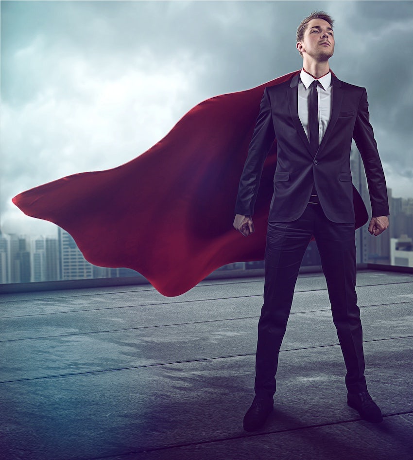 Man in suit and superhero cape wants love