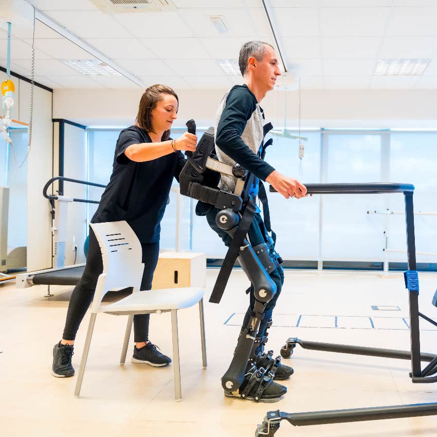 Man using exoskeleton to walk