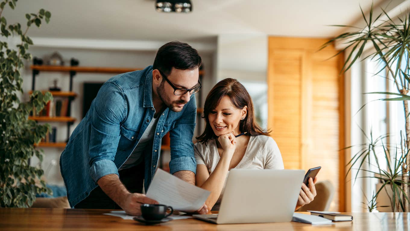 Husband and wife looking at finances