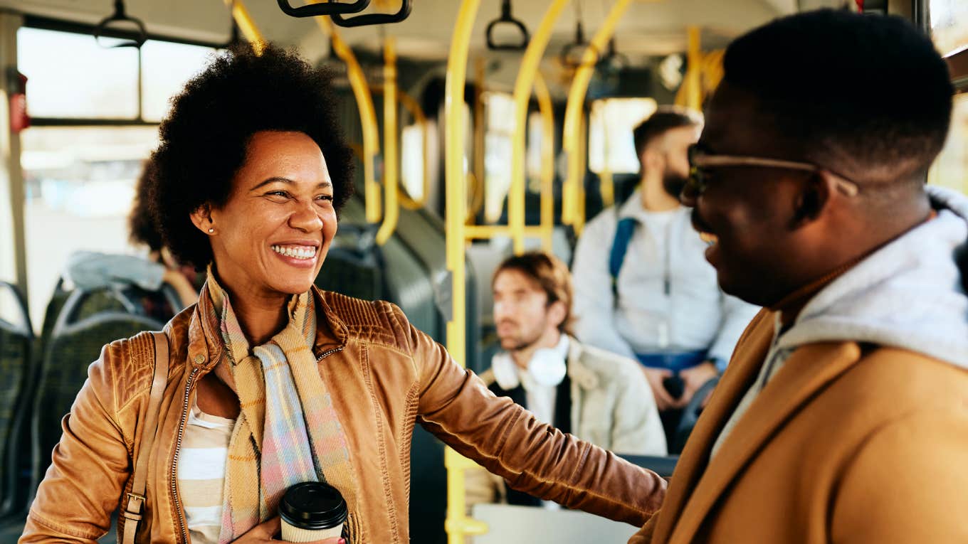 Strong, confident wife talking to husband while commuting.