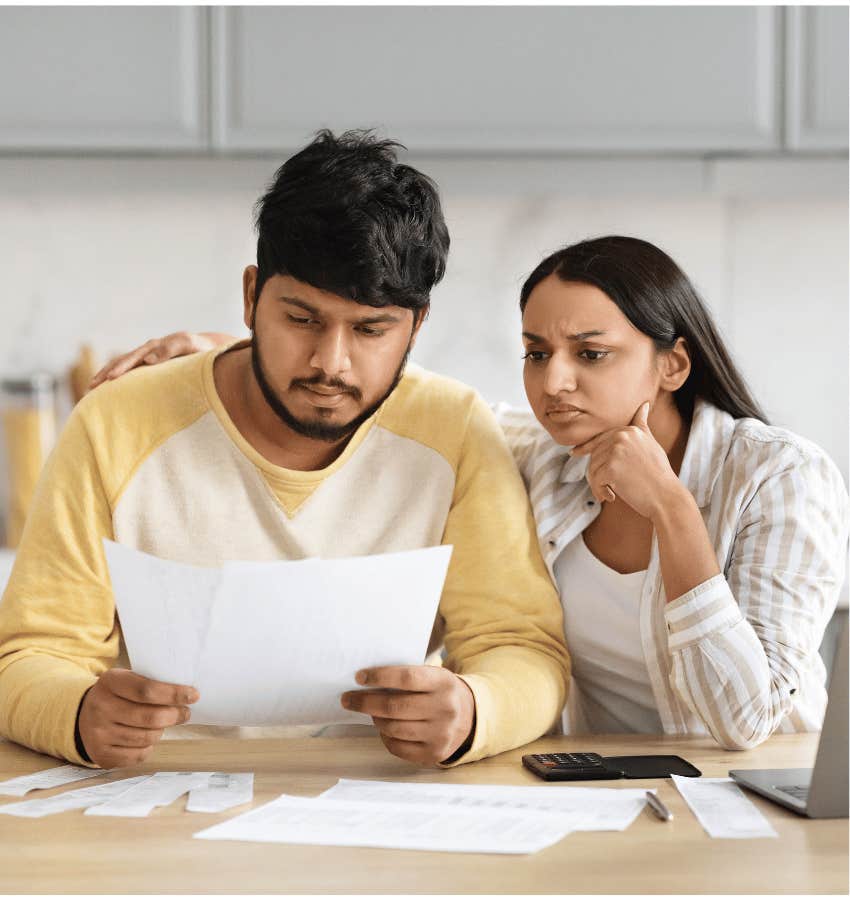 Couple looks at paperwork