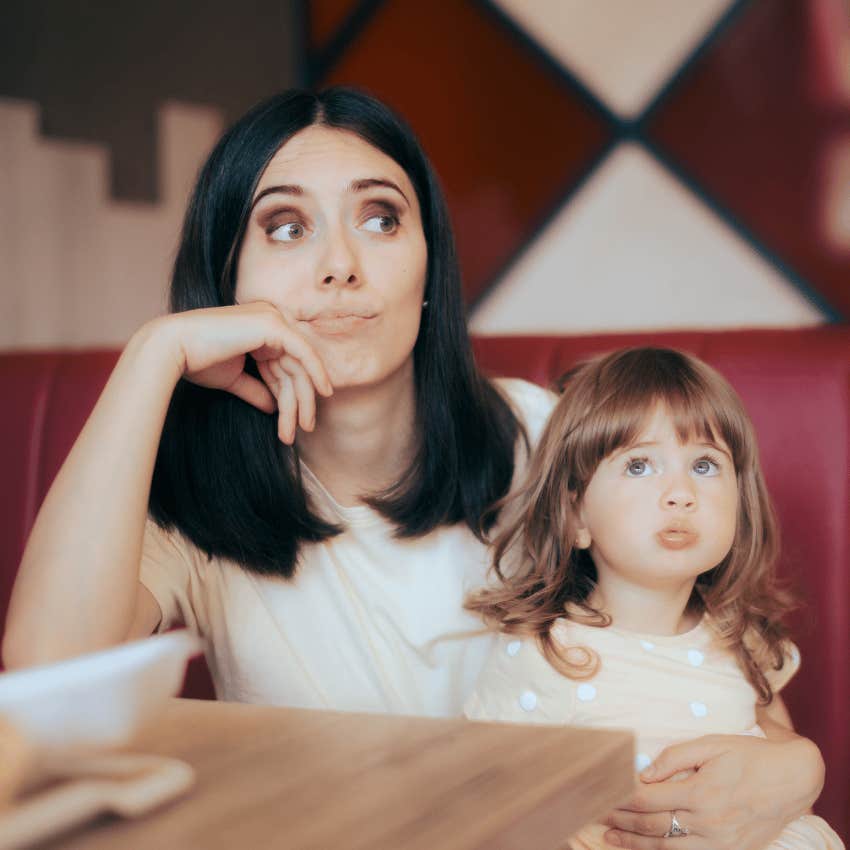 mom and a young child in a restaurant