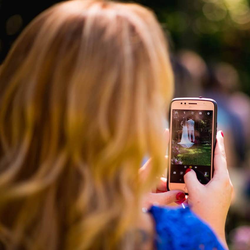 Mother-in-law taking wedding photos