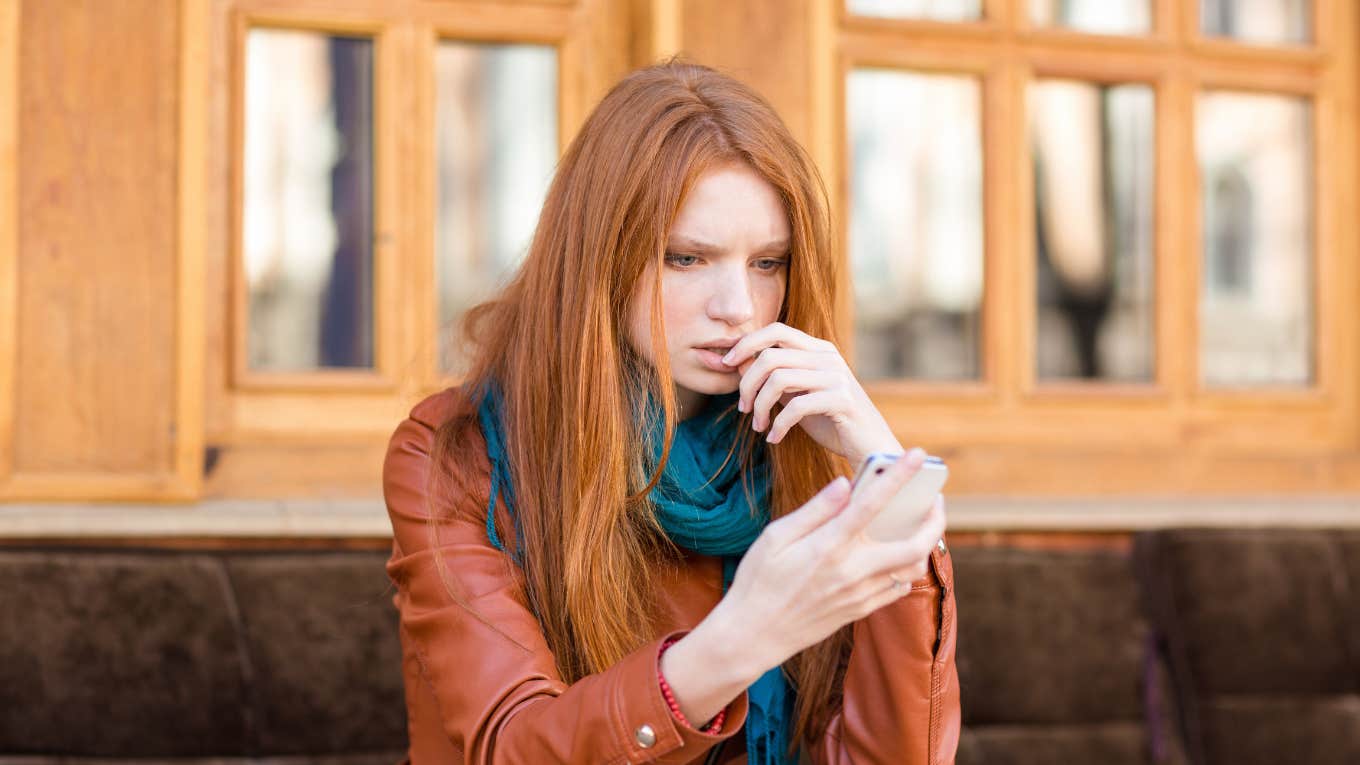 Woman looking at online content on her phone