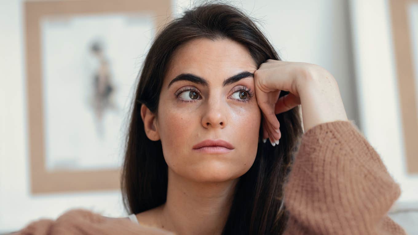 woman looking stressed and thinking