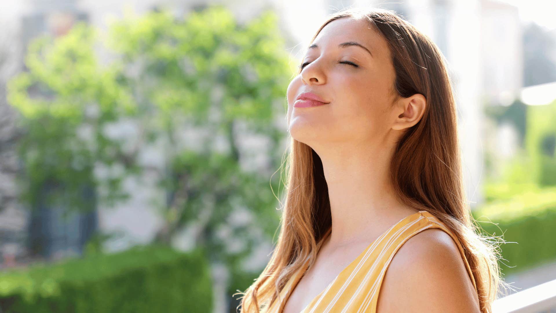 woman smiling outside