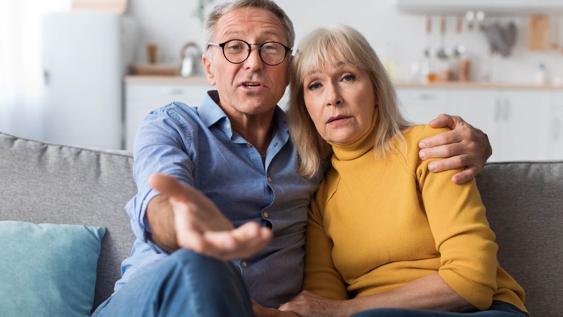 Older couple having a serious conversation.