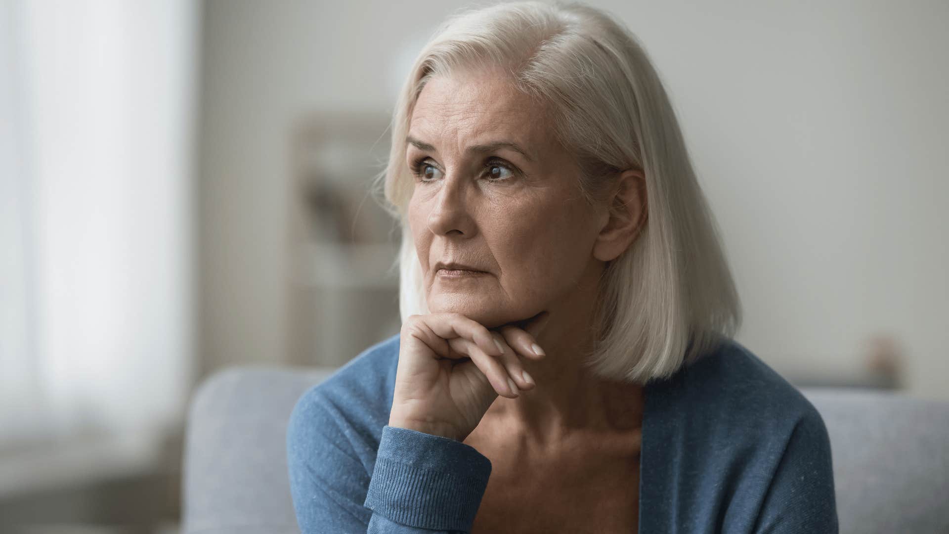 woman looking off while thinking 